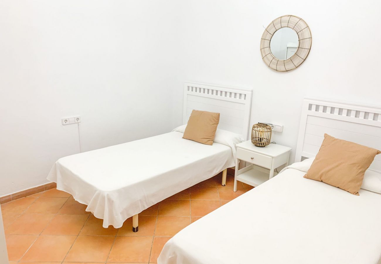 Schlafzimmer mit 2 Einzelbetten der Finca Ca Na Mera in Campos